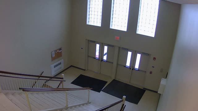 MEVA camera G420 looking at the entrance doors and stairs